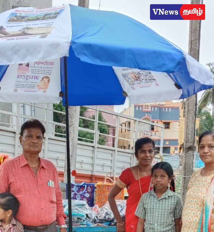 வெயிலில் உழைக்கும் பெண்ணுக்கு குடை வழங்கிய மகாவீர் இன்டர்நேஷனல் சென்னை கோல்ட் சென்டர்